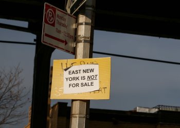 east new york is not for sale sign on lightpole