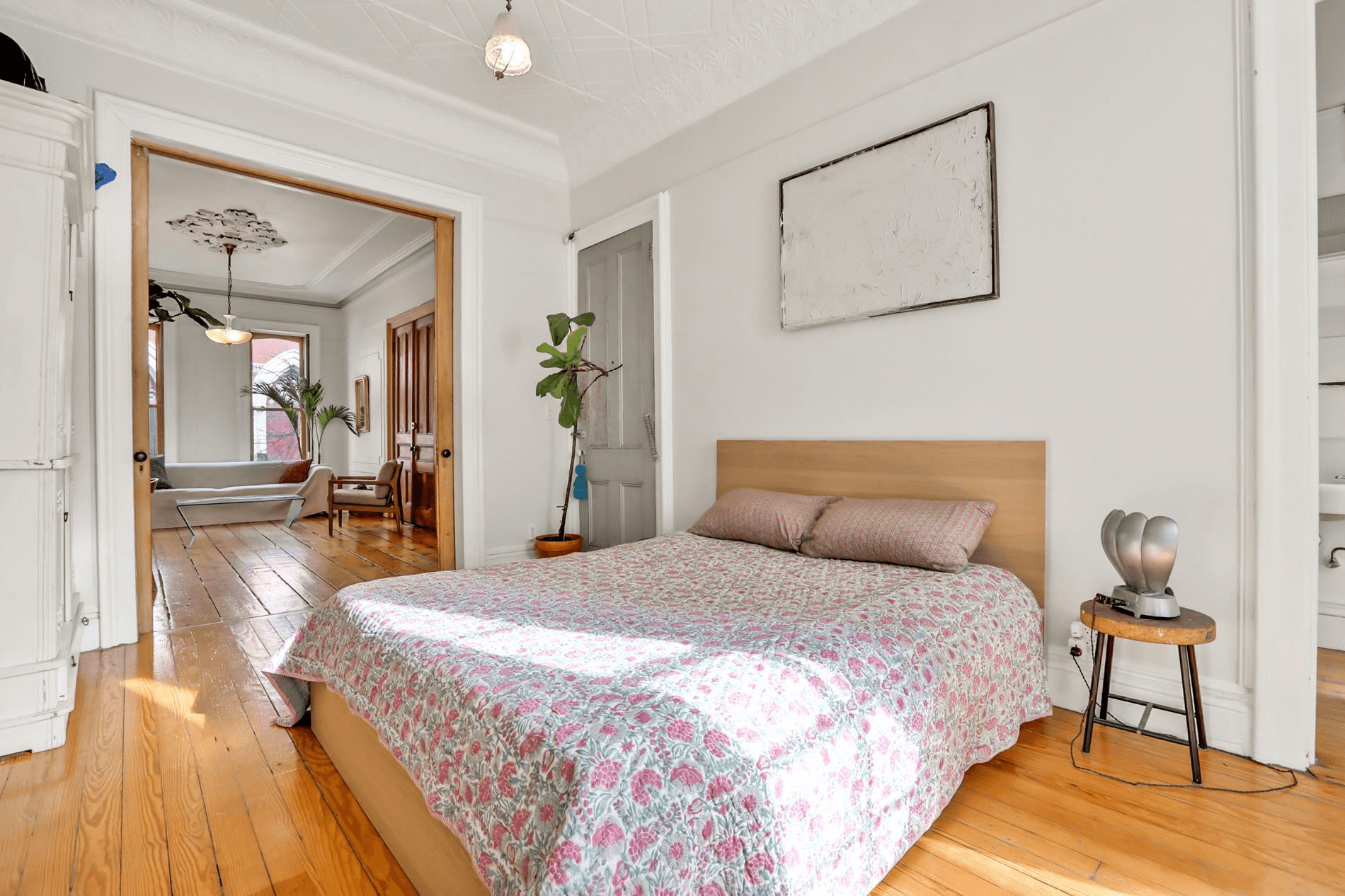 bedroom with wood floors