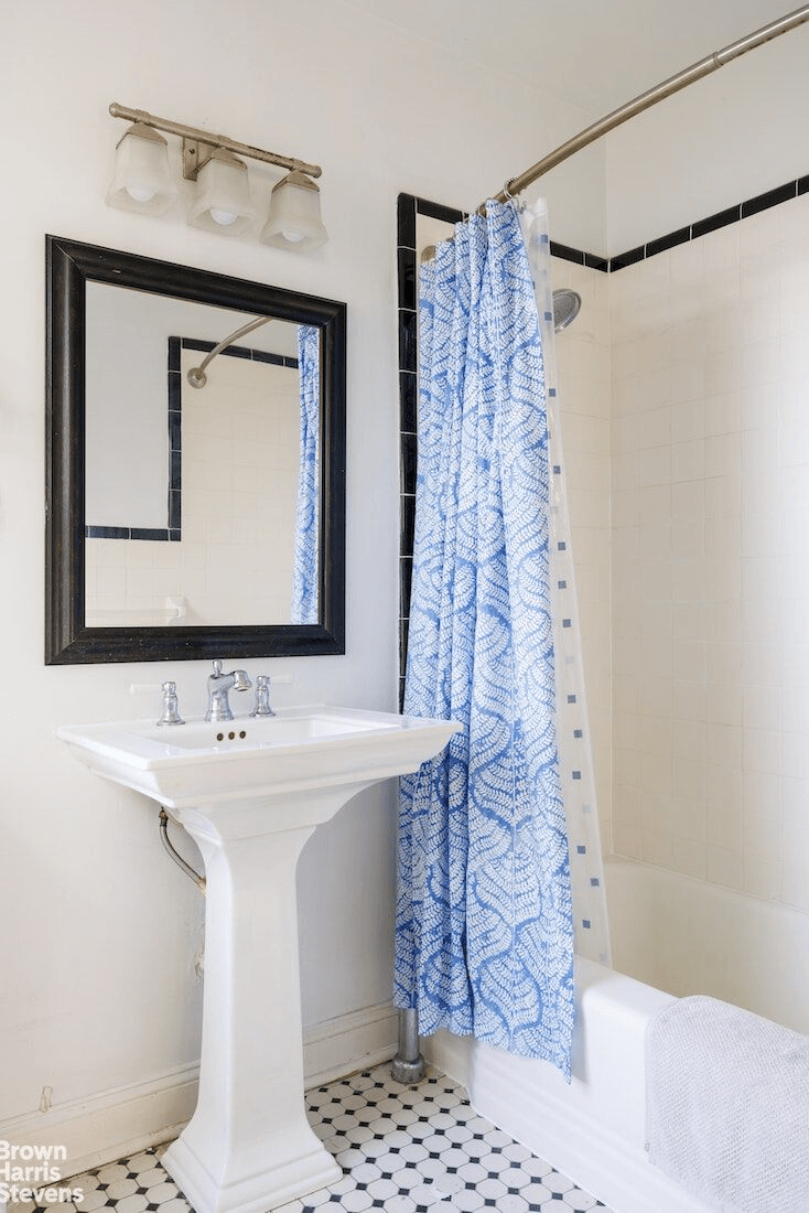 bathroom with pedestal sink