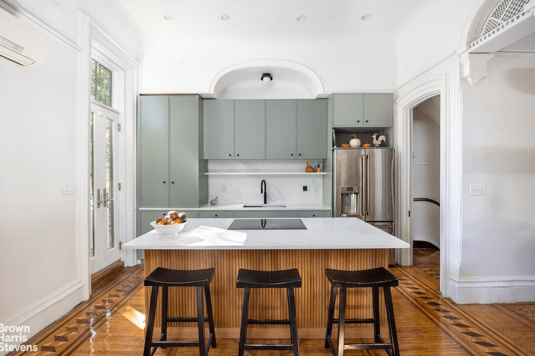 kitchen with island and doors to garden