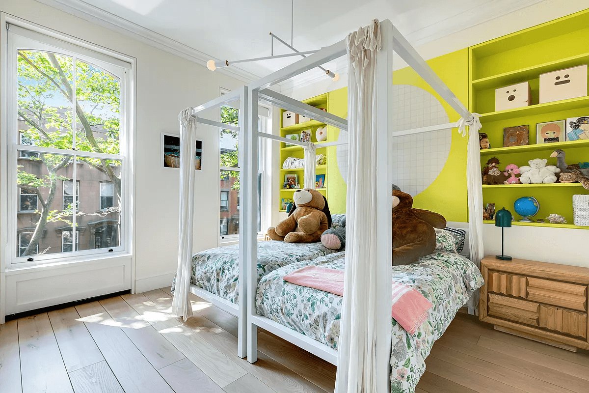 bedroom with pale wood floors