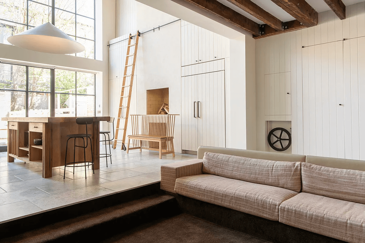 conversation pit and view of kitchen