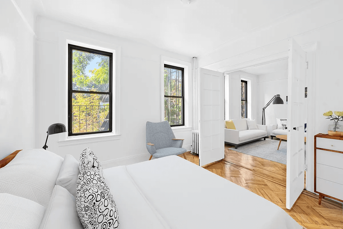 bedroom with French doors to living room