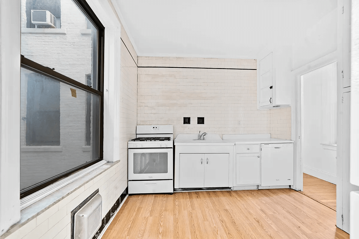 kitchen with tile walls and vintage sink