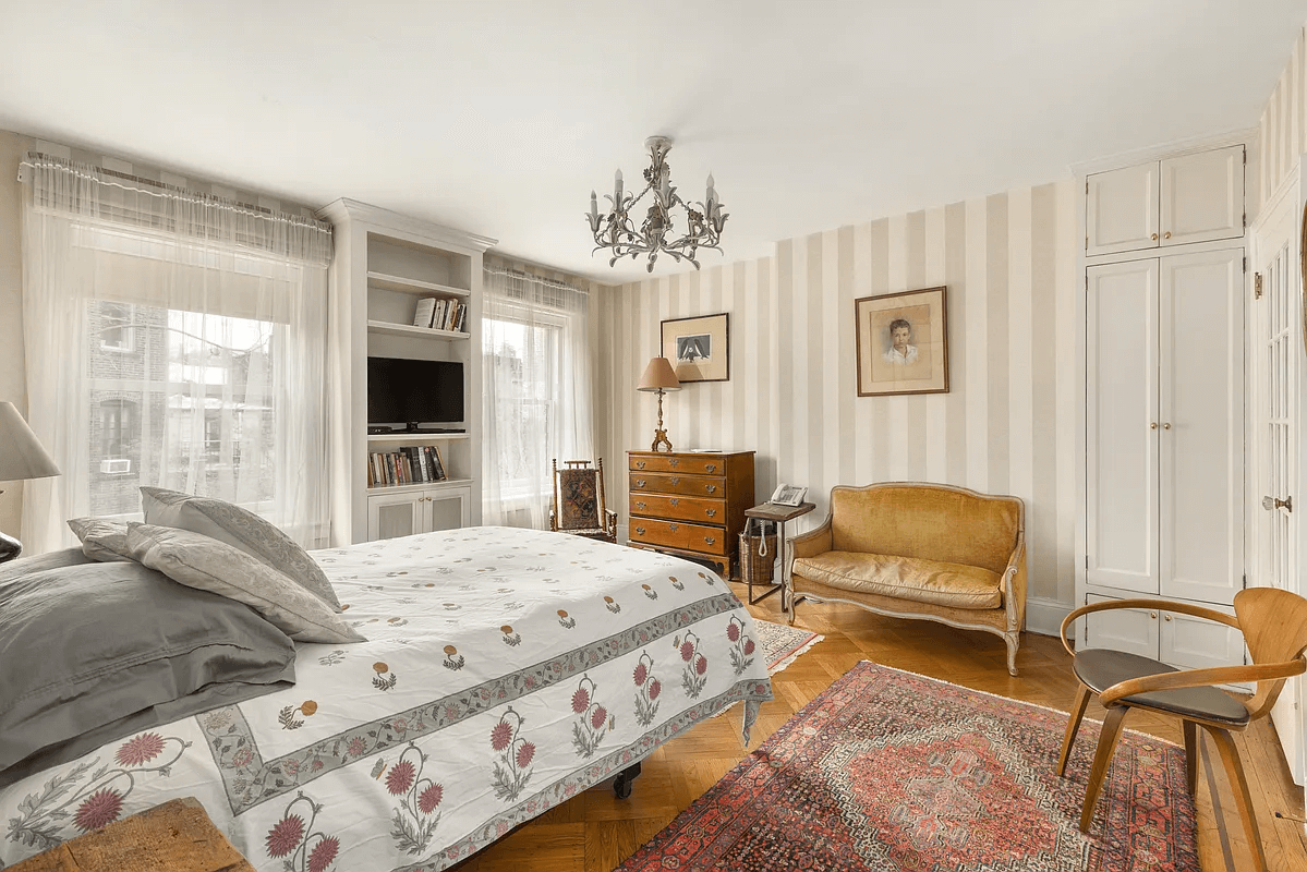 bedroom with striped wallpaper