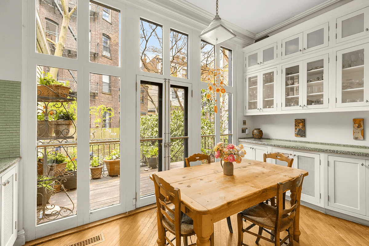 kitchen with wall of windows and doors