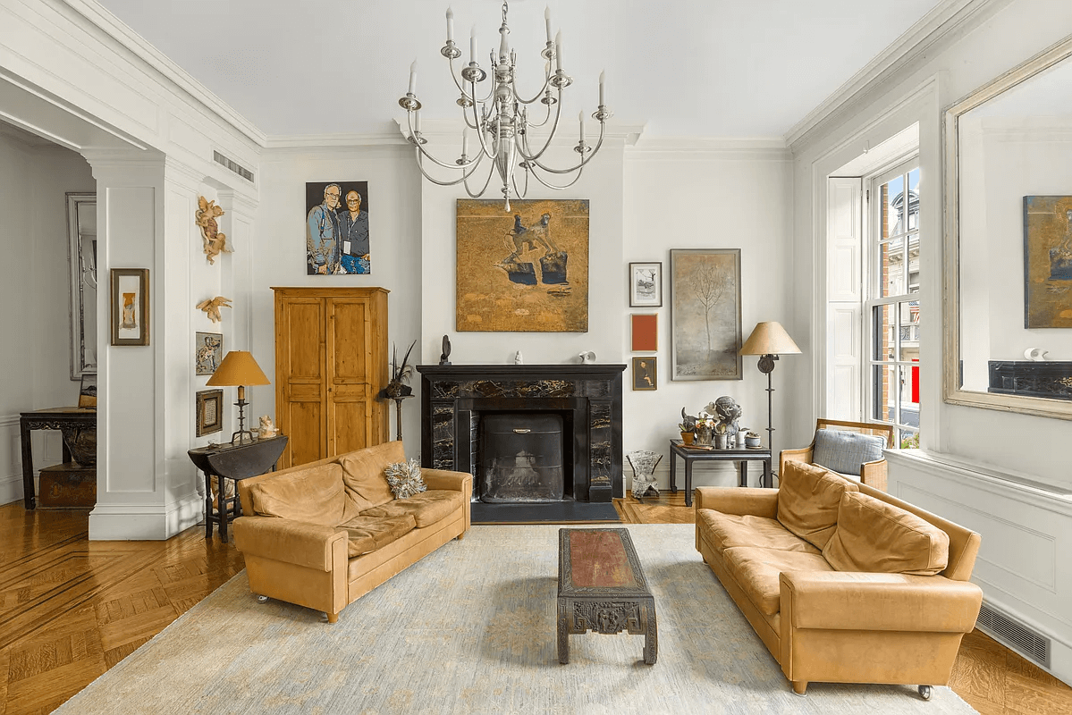 parlor with mantel and interior shutters