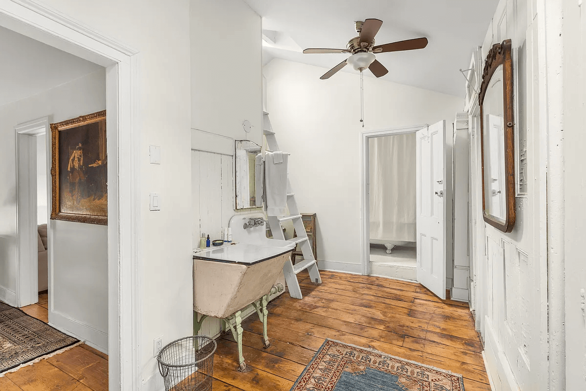 top floor hall with wood floor