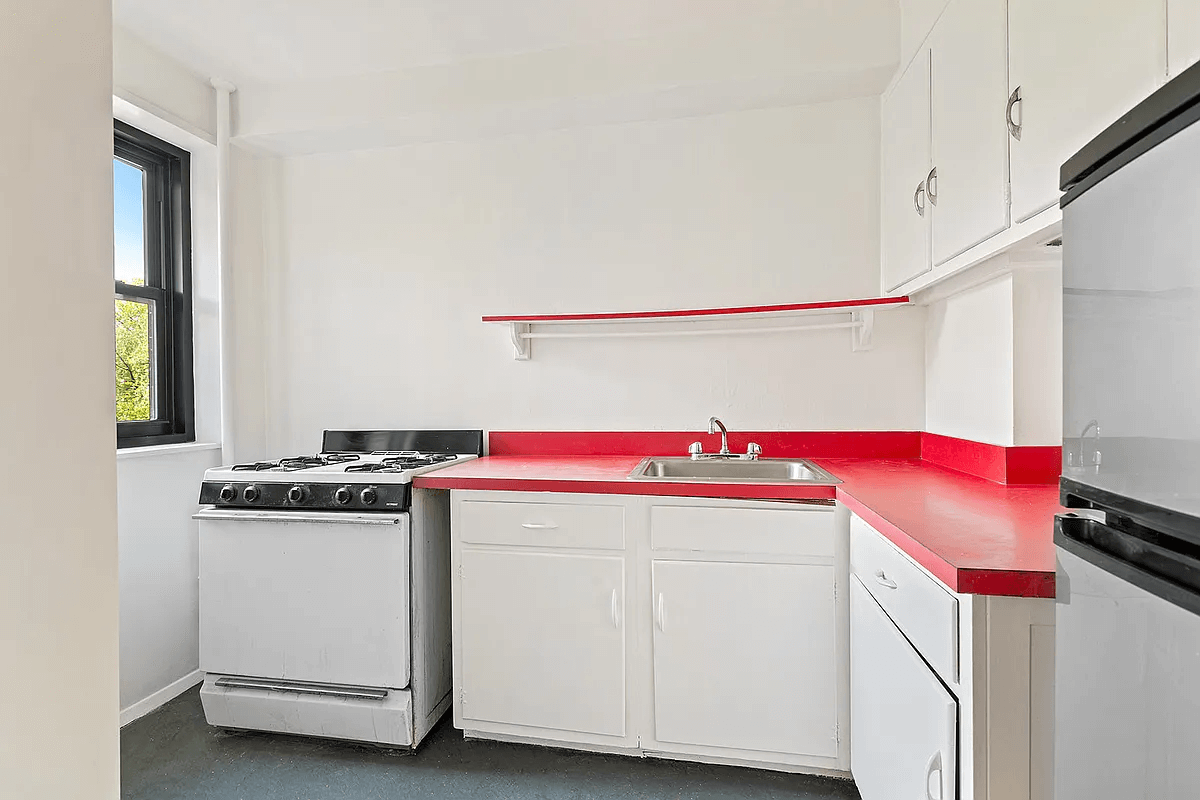 kitchen with red counter top