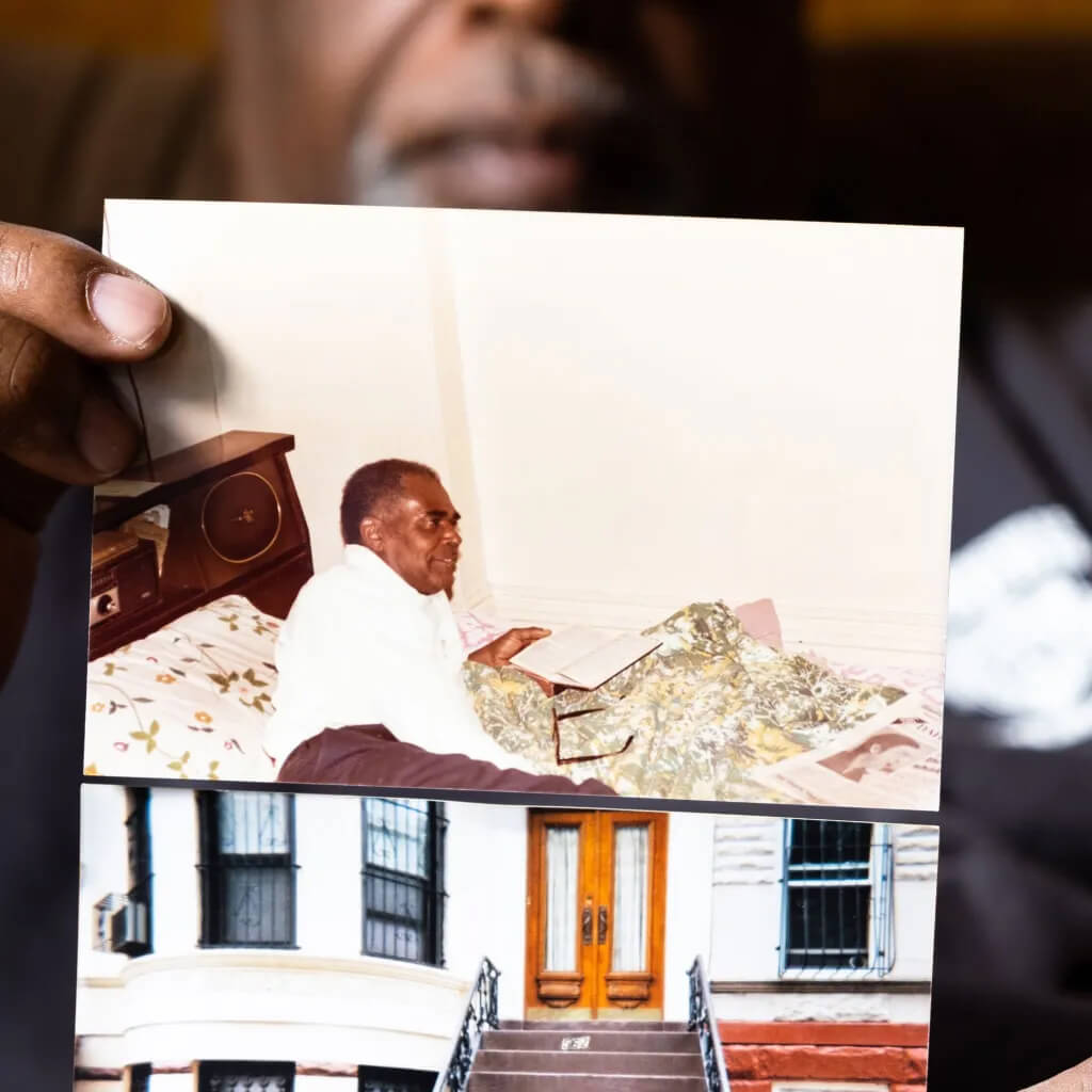 deed seizure - man holding photos