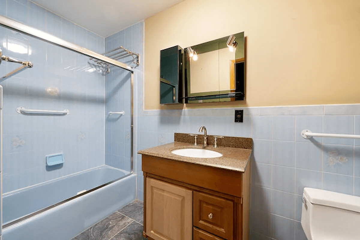 bath with blue wall tiles