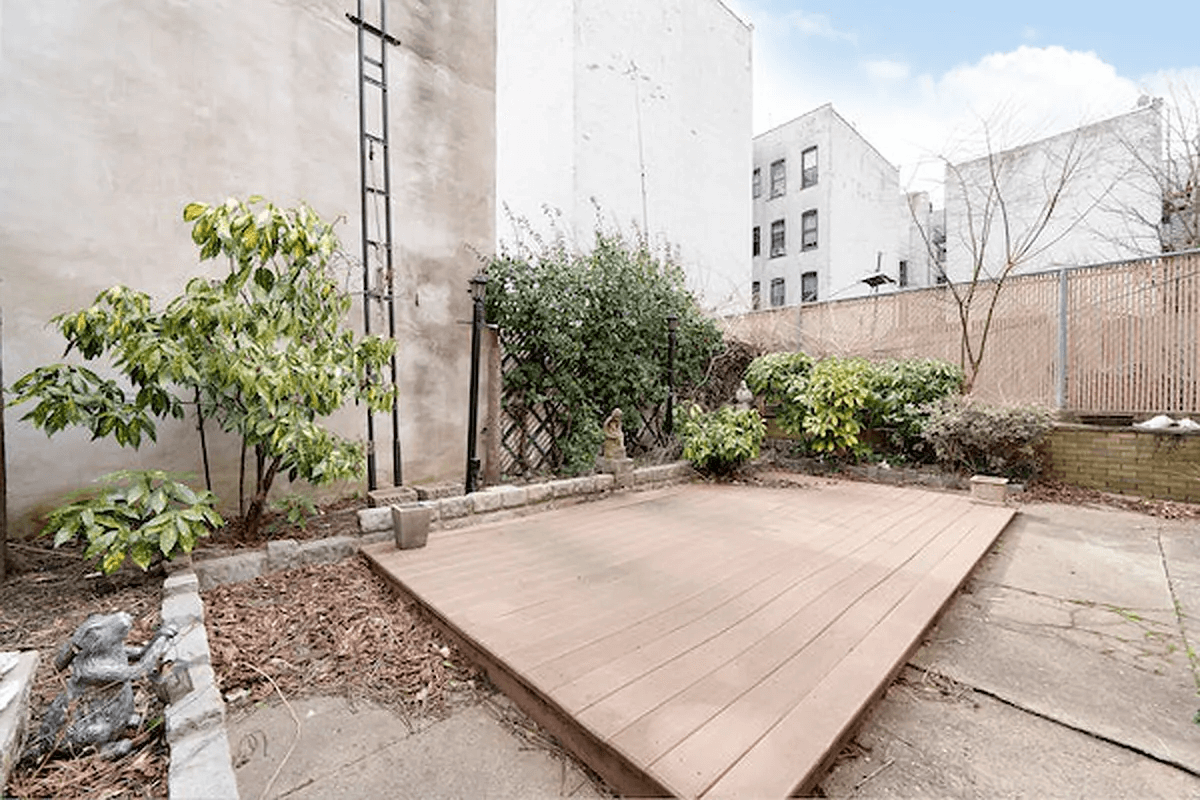 garden with concrete pad