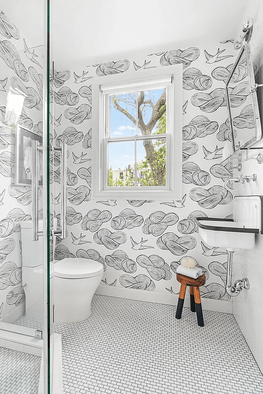 bathroom with black and white wallpaper