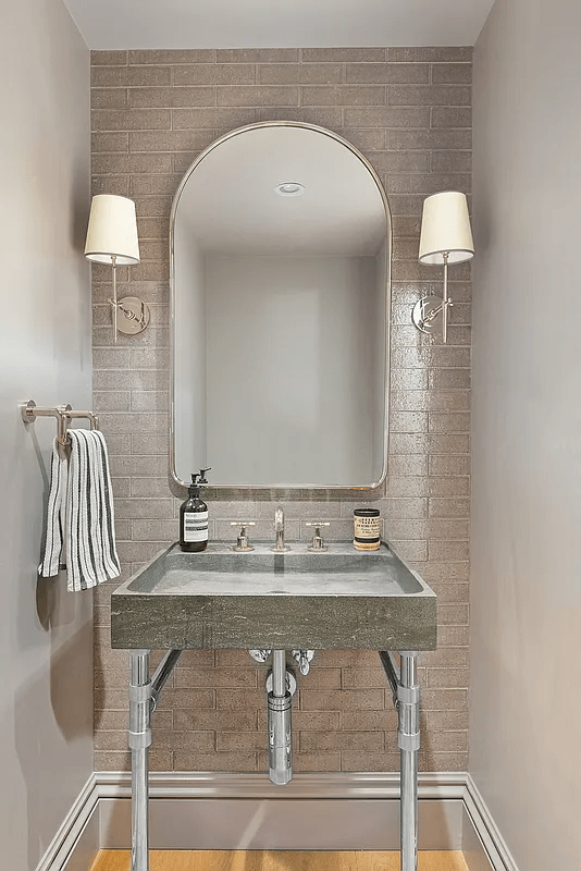 powder room with sconces