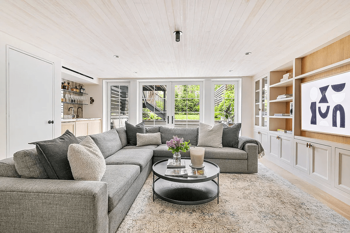 living room with glass doors to garden