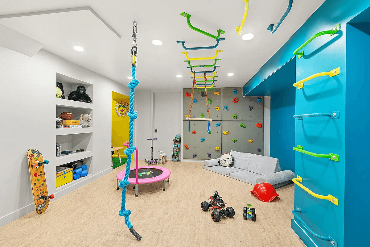 play room with shelves and recessed lighting