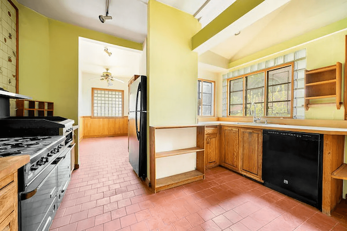 kitchen with tile floor and yellow walls