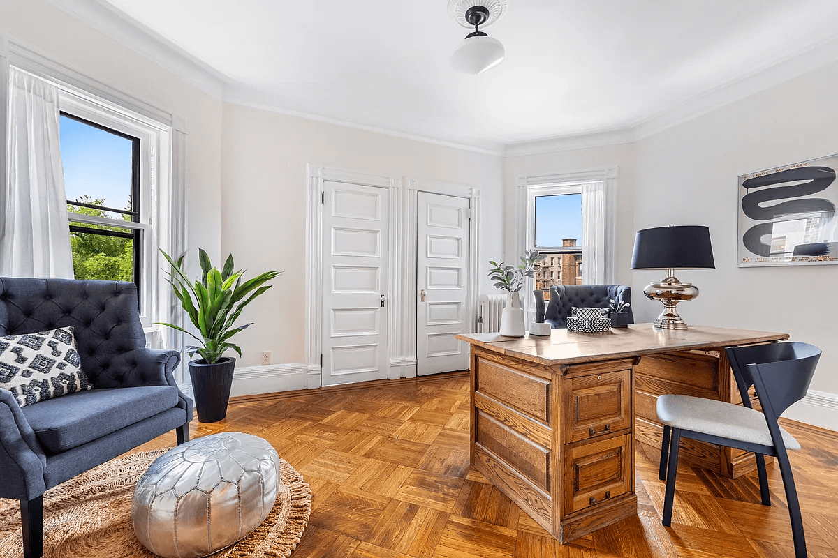 bedroom with two windows set up as an office