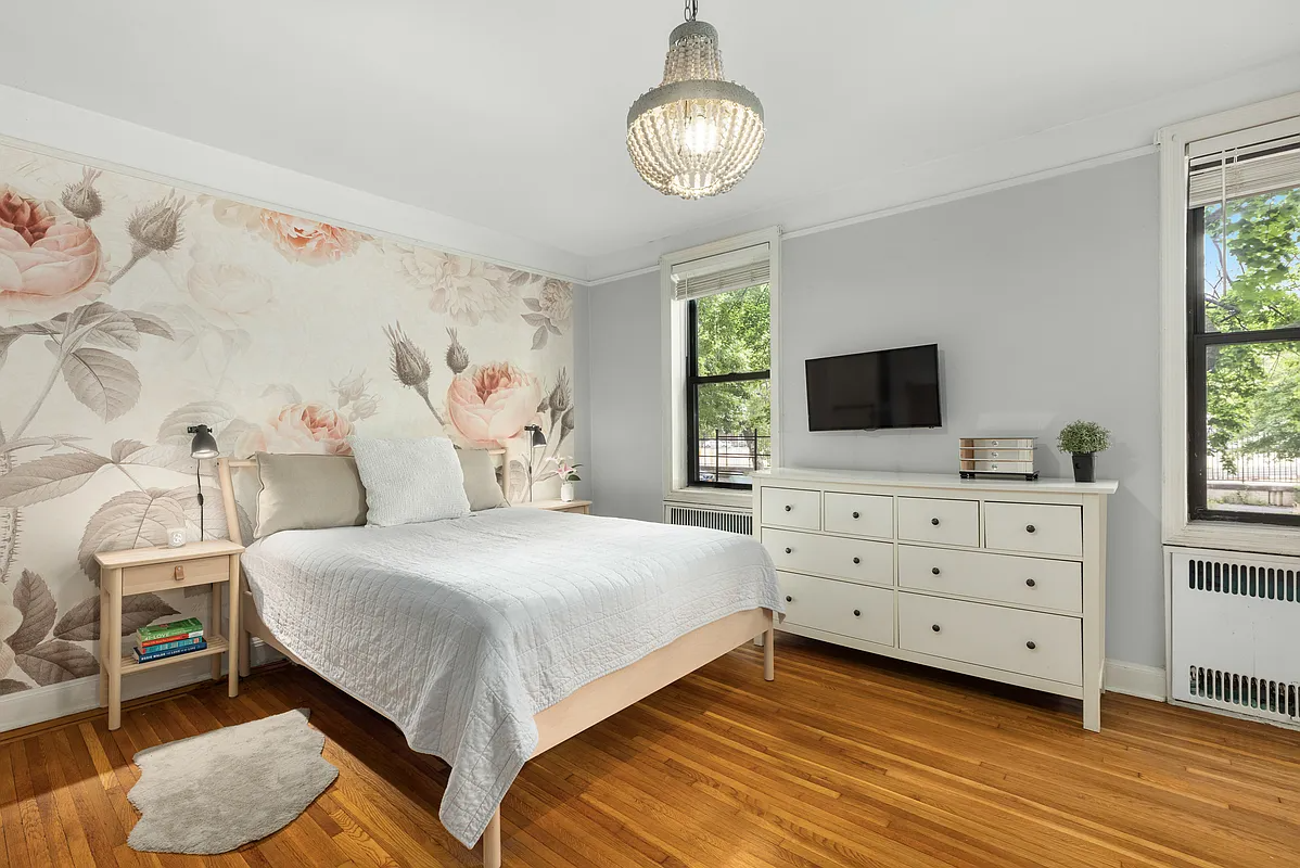 bedroom with floral wallpaper