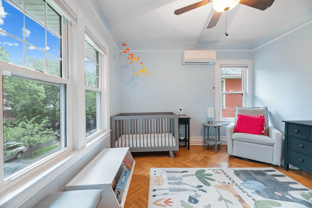 bedroom with two exposures and a ceiling fan