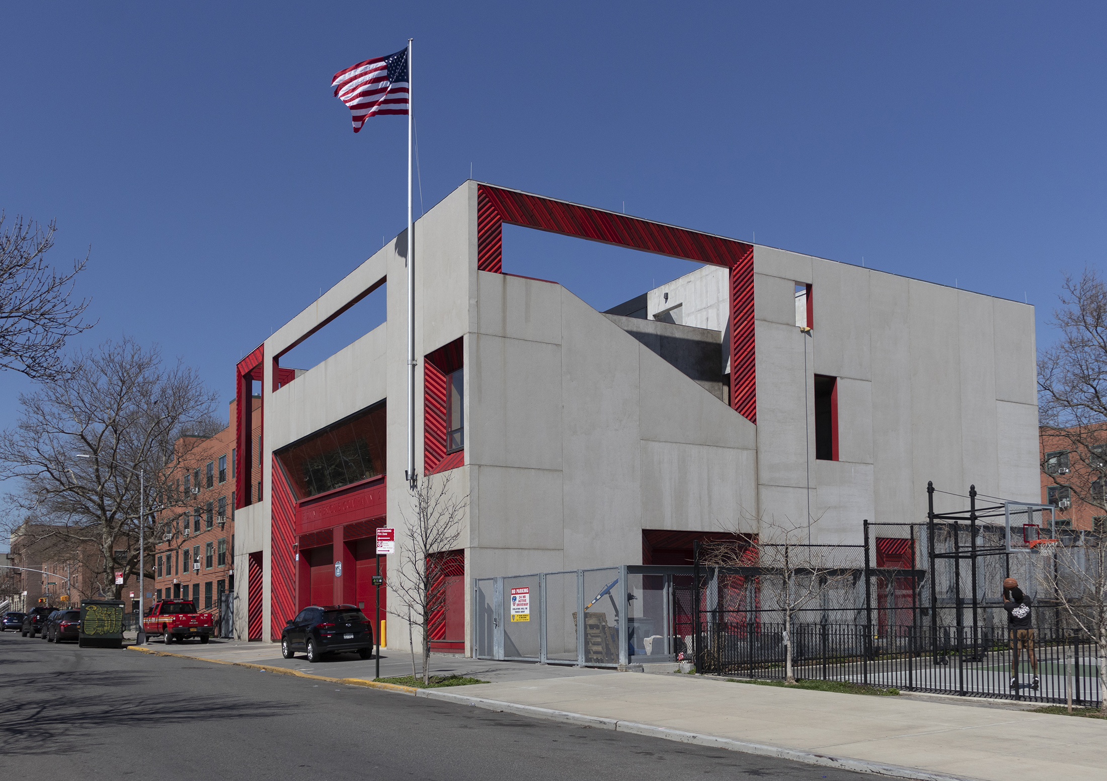 the white and red exterior of the firehouse