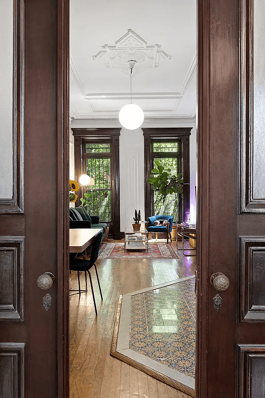 view through pocket doors to the living room