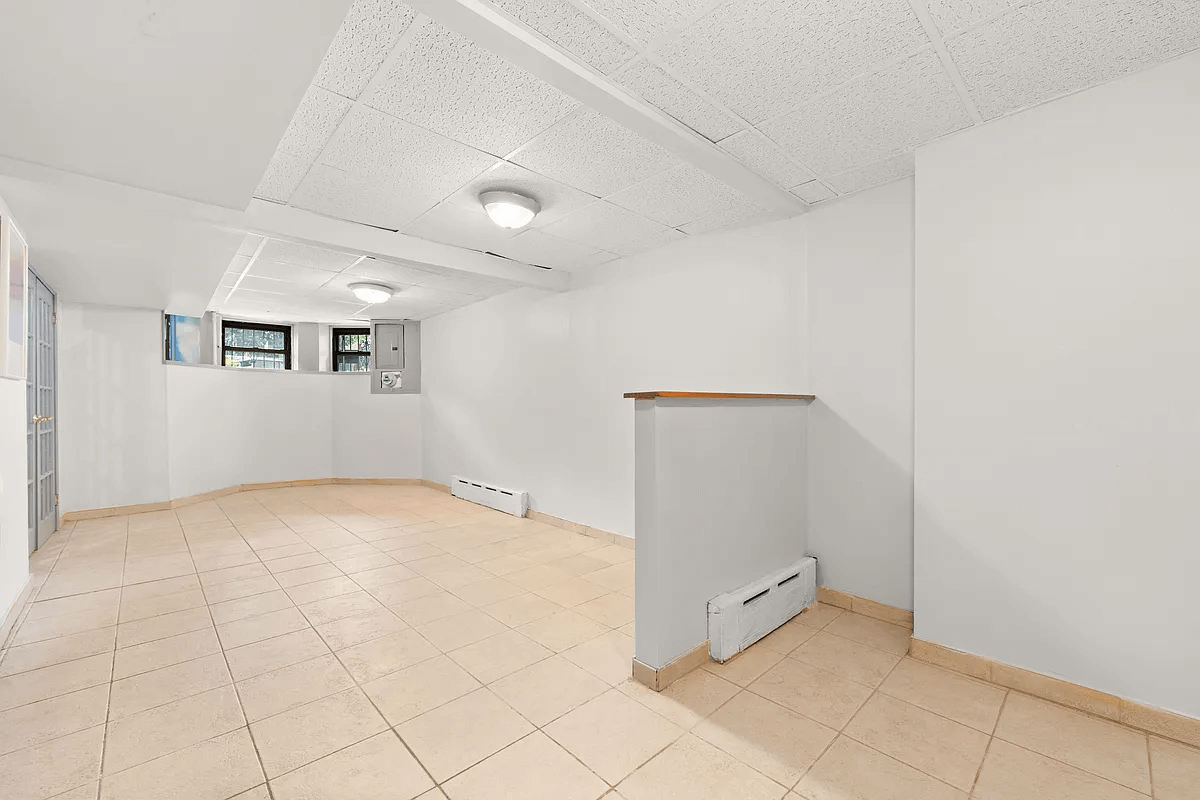 garden level with tile floor and dropped ceiling