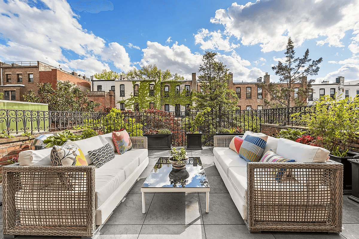 second floor terrace with room for seating and planters