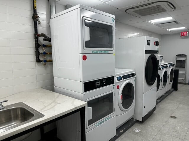 laundry room with washers and dryers