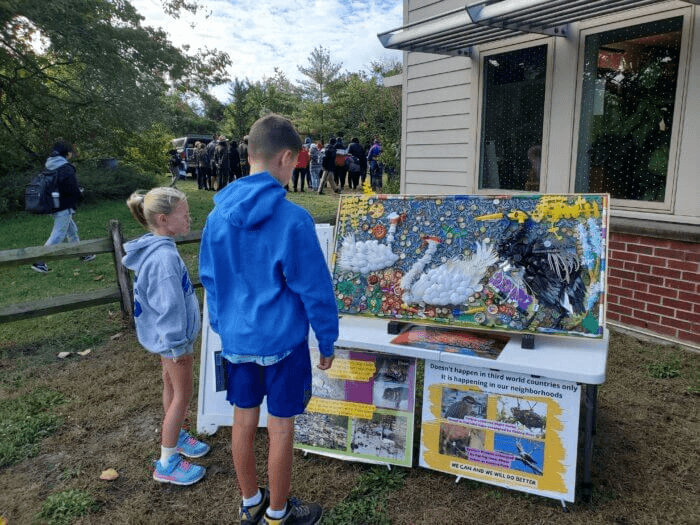 children looking at artwork