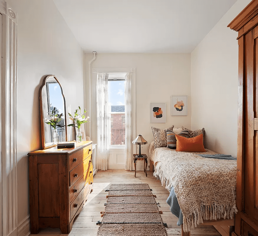 bedroom with pale wood floor