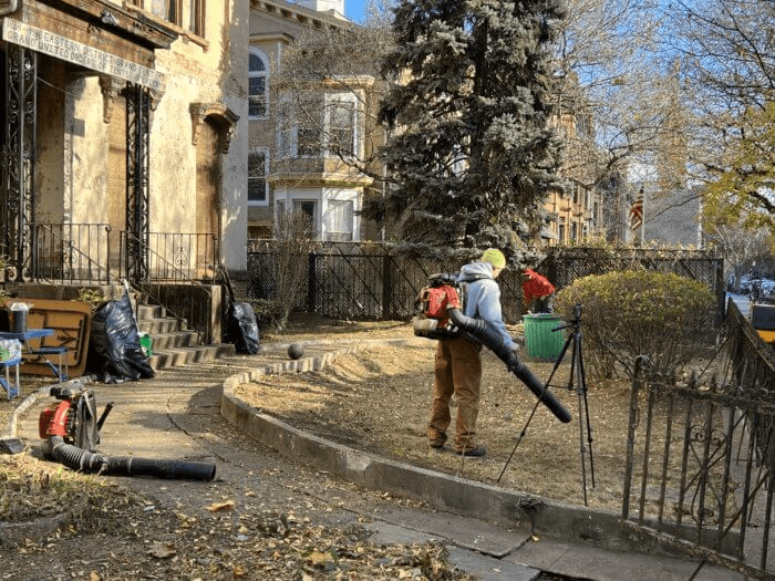 volunteers cleaning up leaves