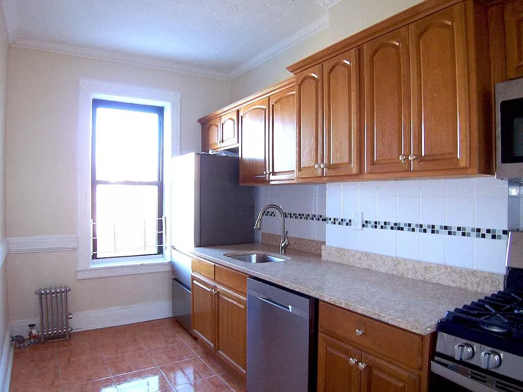 kitchen with wood cabinets and a dishwasher