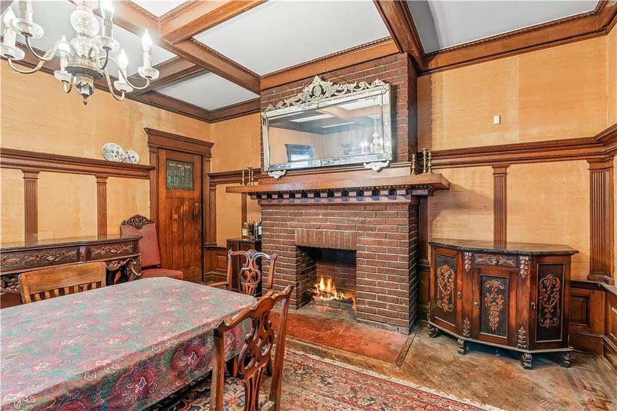 dining room with coffered ceiling