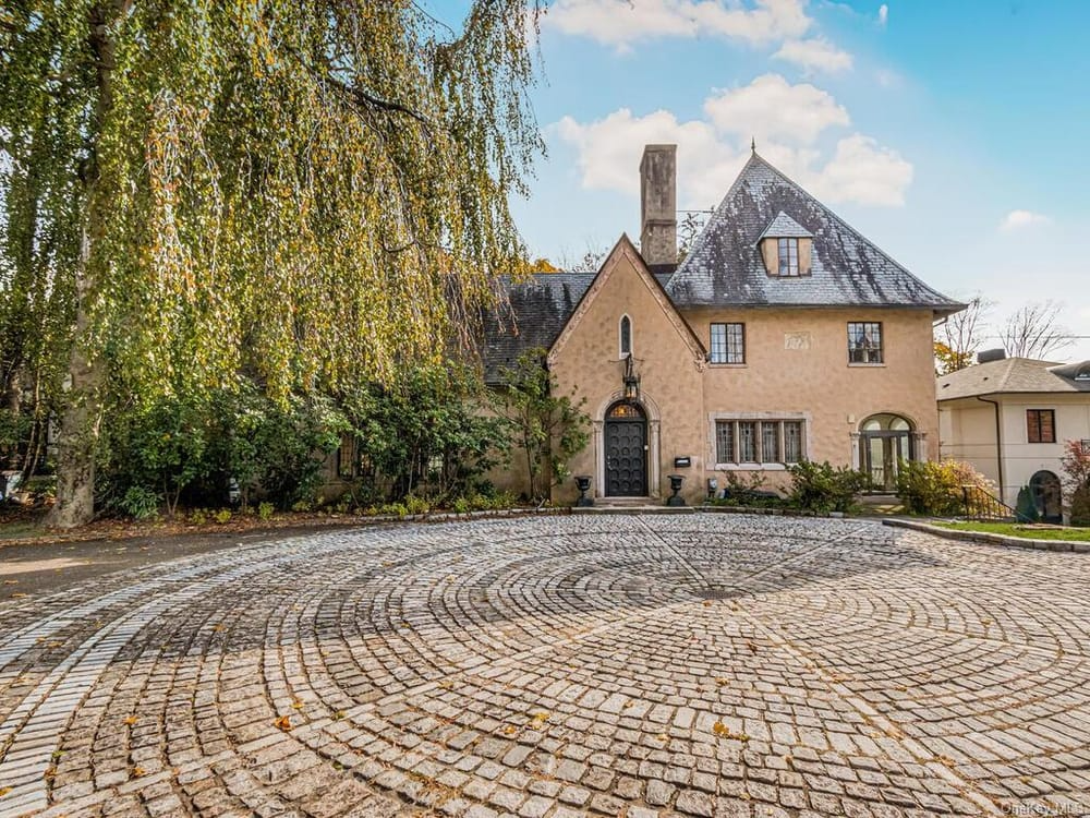 new rochelle - house exterior with stone circular drive