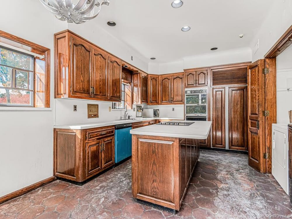 kitchen with wood cabinets and tile floor