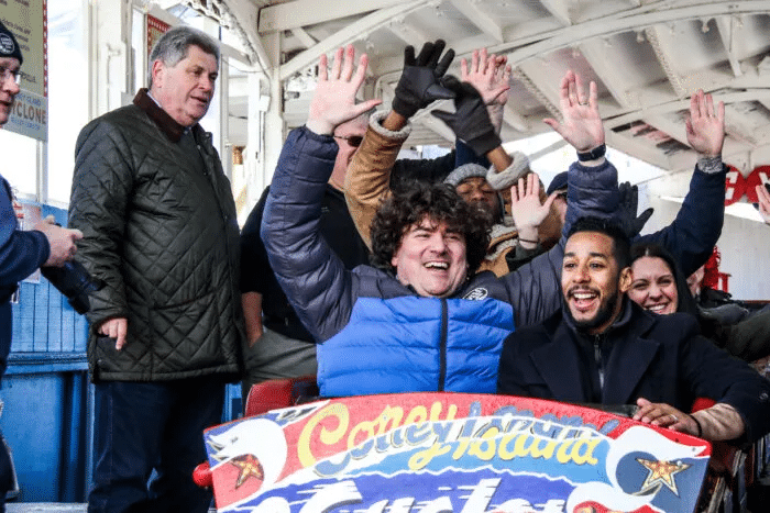 people in a cyclone car