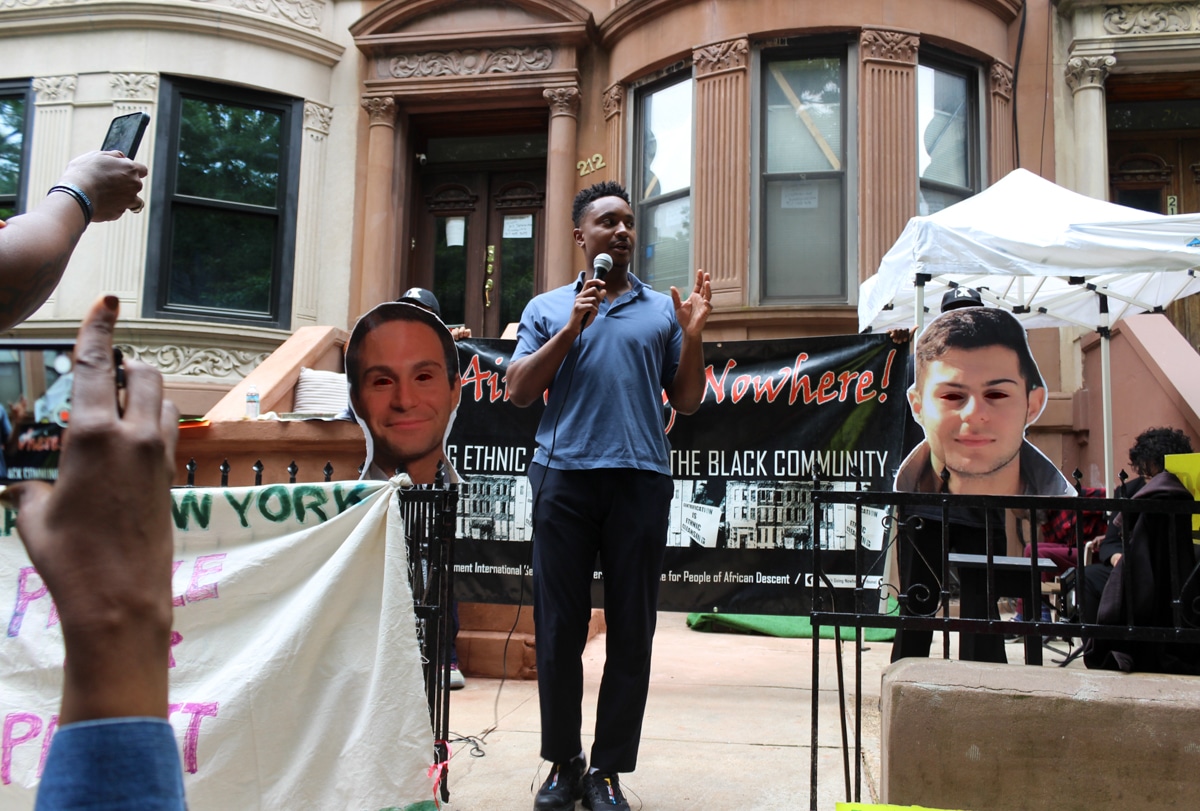 speaker on stoop with microphone