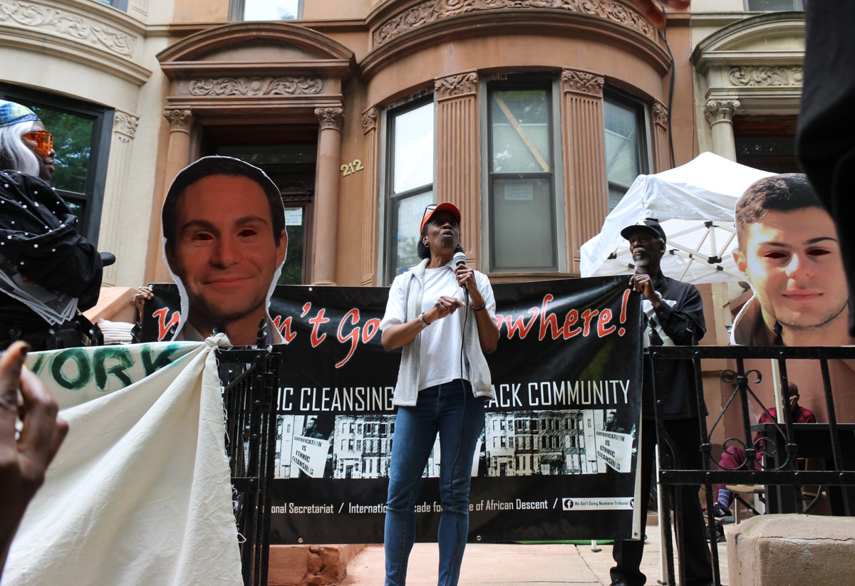 speaker on stoop with microphone