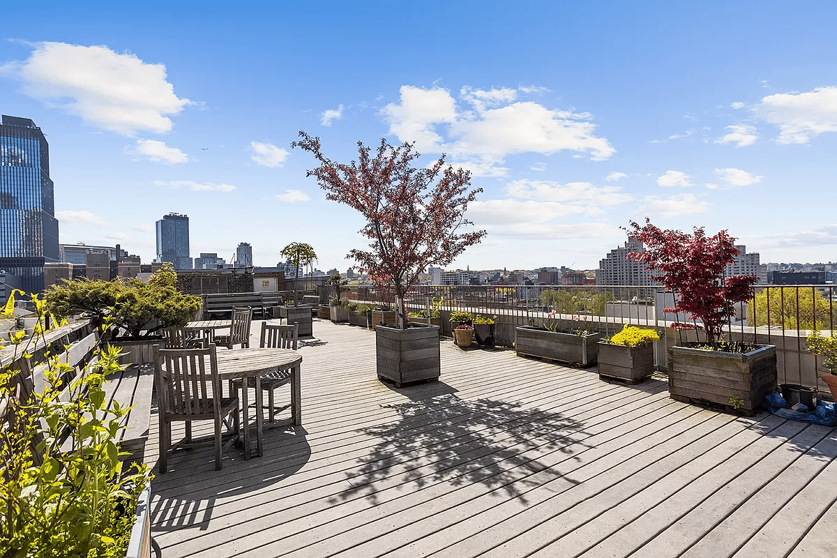 roof deck with seating, tables and planters