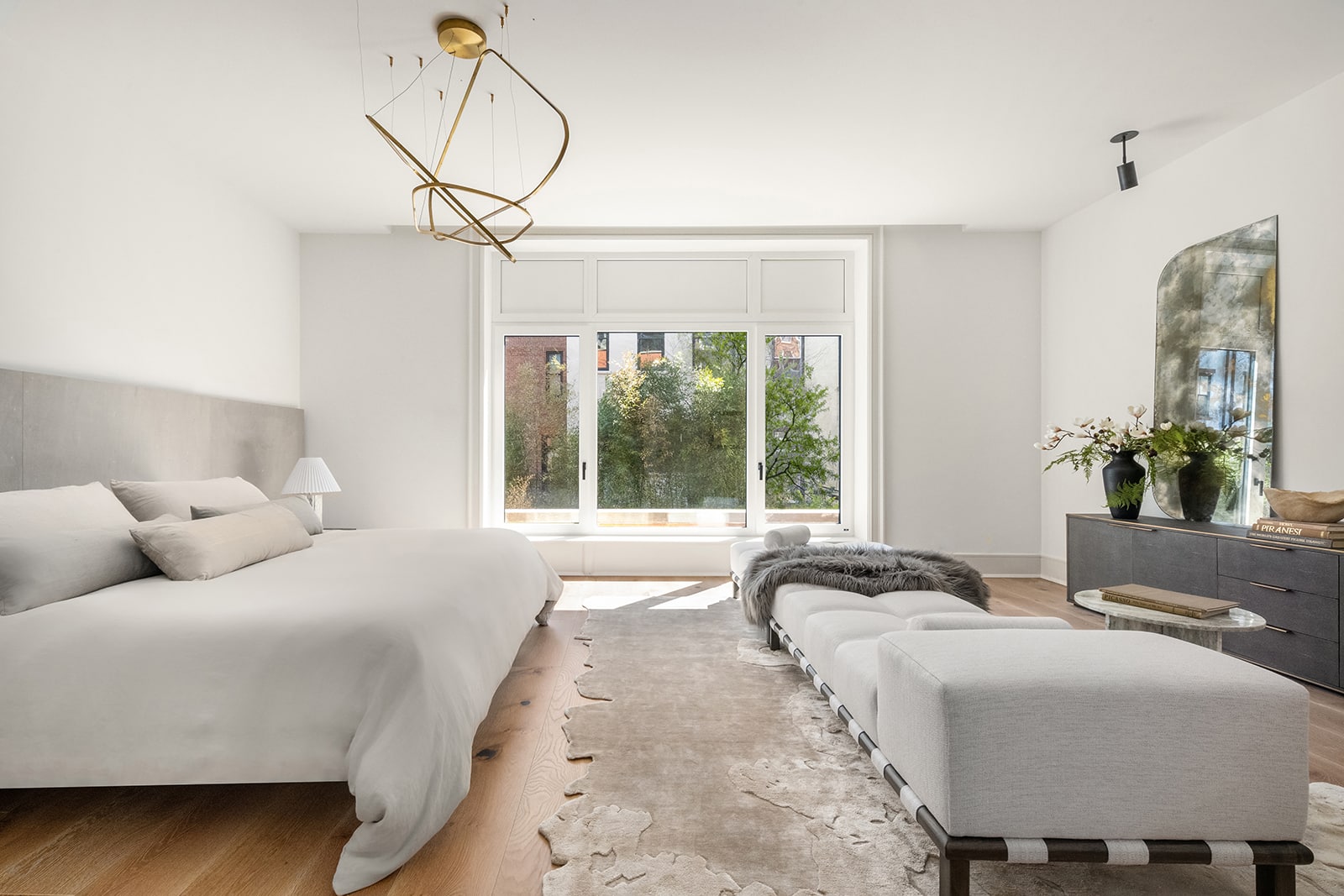 bedroom with wood floor, white walls