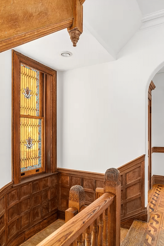 stained glass window at stair landing