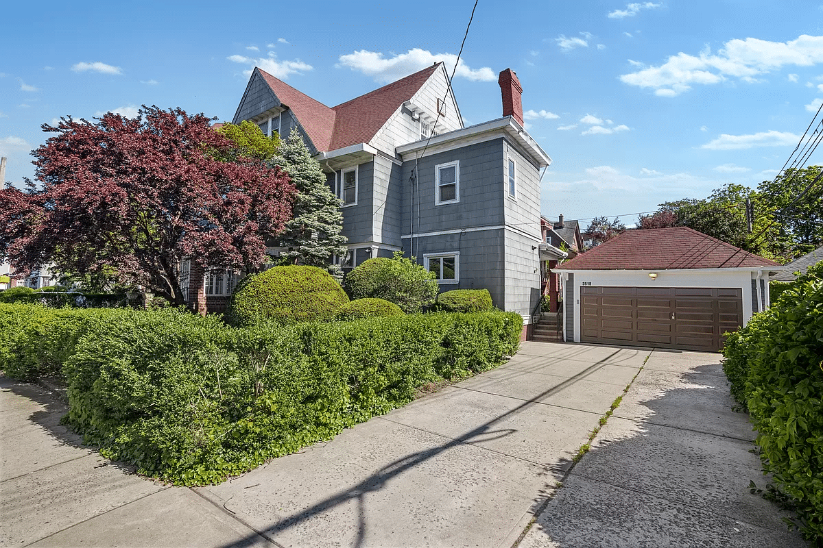 exterior showing driveway to garage