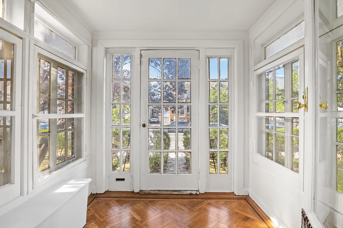 windowed vestibule used as a mudroom