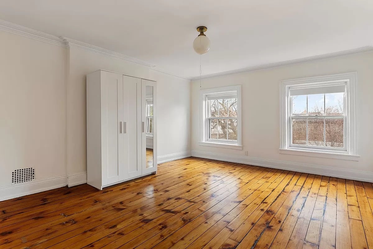 bedroom with wood floor