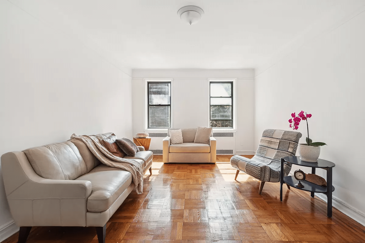 living room with parquet floor, two windows