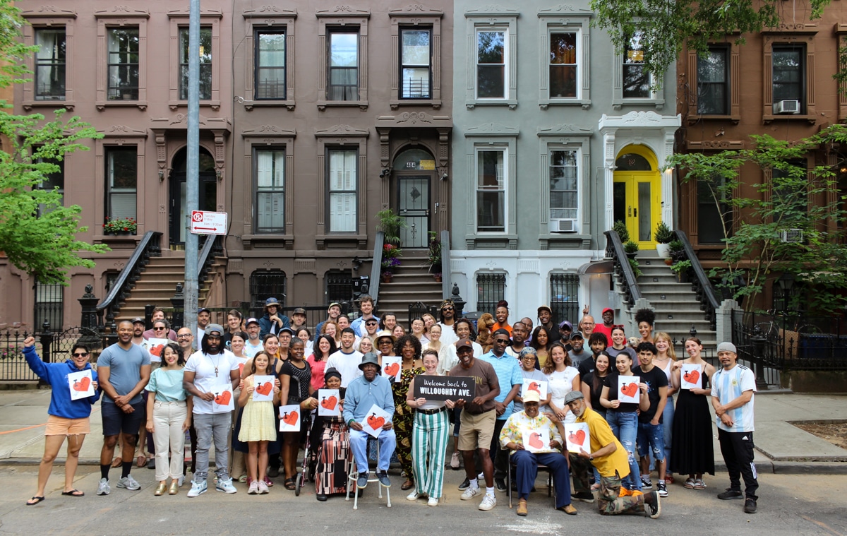 bed stuy - residents of willoughby avenue posing in front of row houses