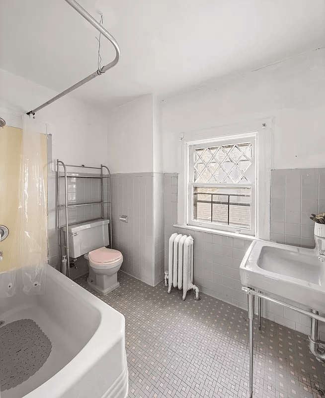 vintage bathroom with gray fixtures and tile