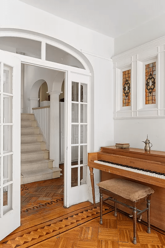 parlor with french doors, stained glass