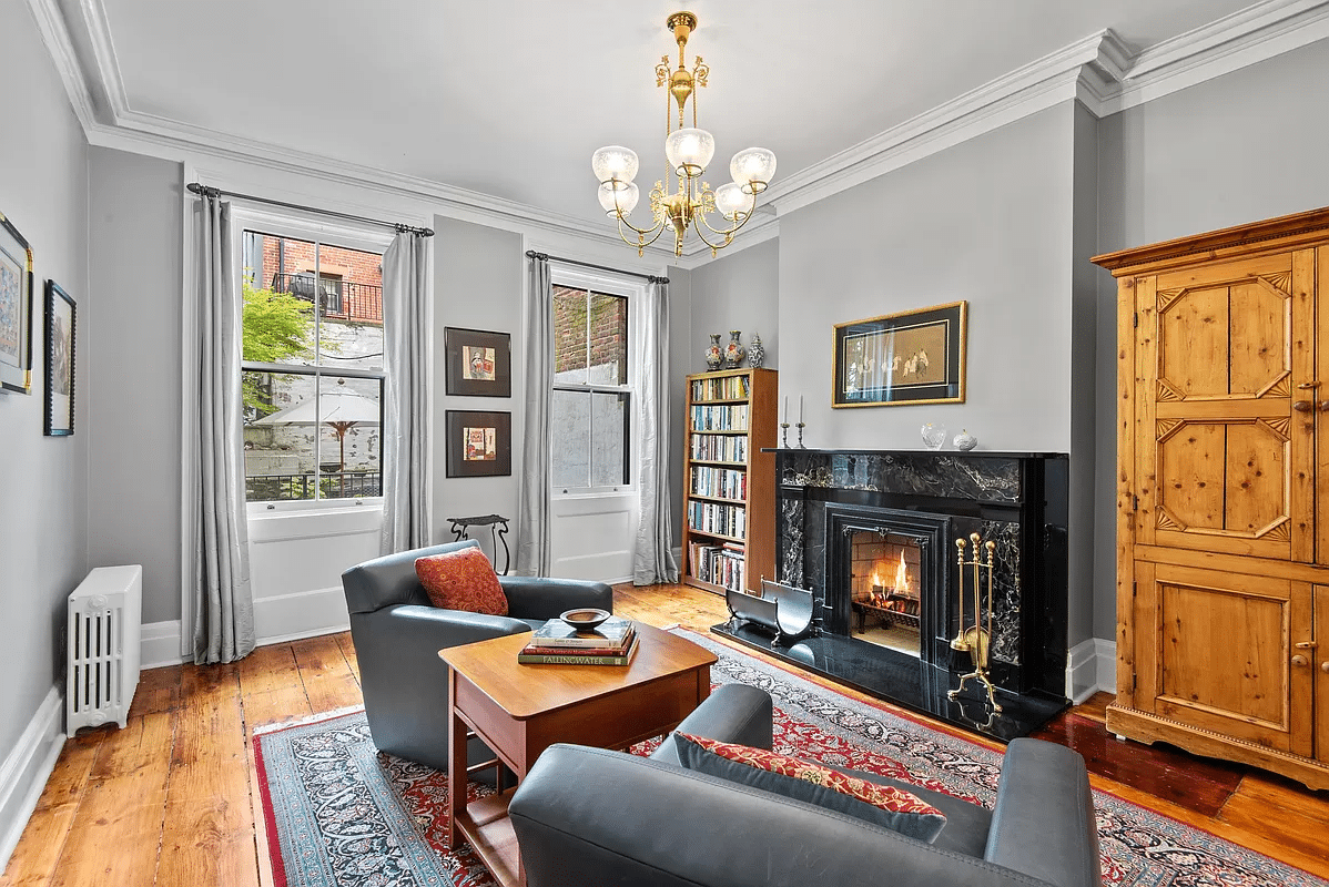 parlor with black marble mantel